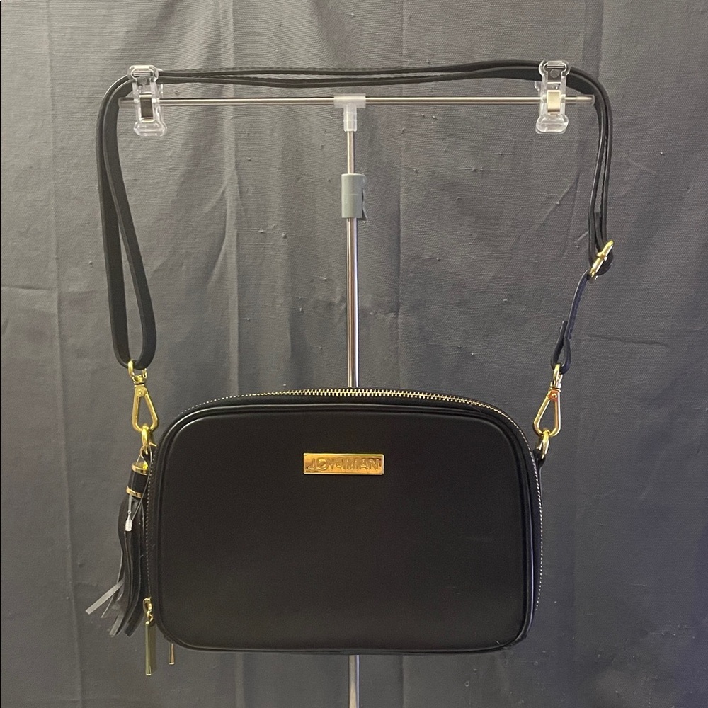 Elegant Black Crossbody Bag with Gold Accents